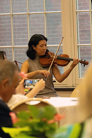 person playing a violin